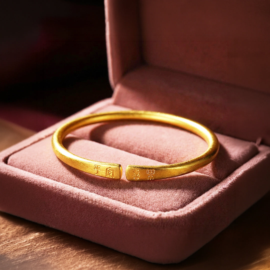 Ping An Xi Le Engraved Gold Bangle Bracelet | Luxe6543